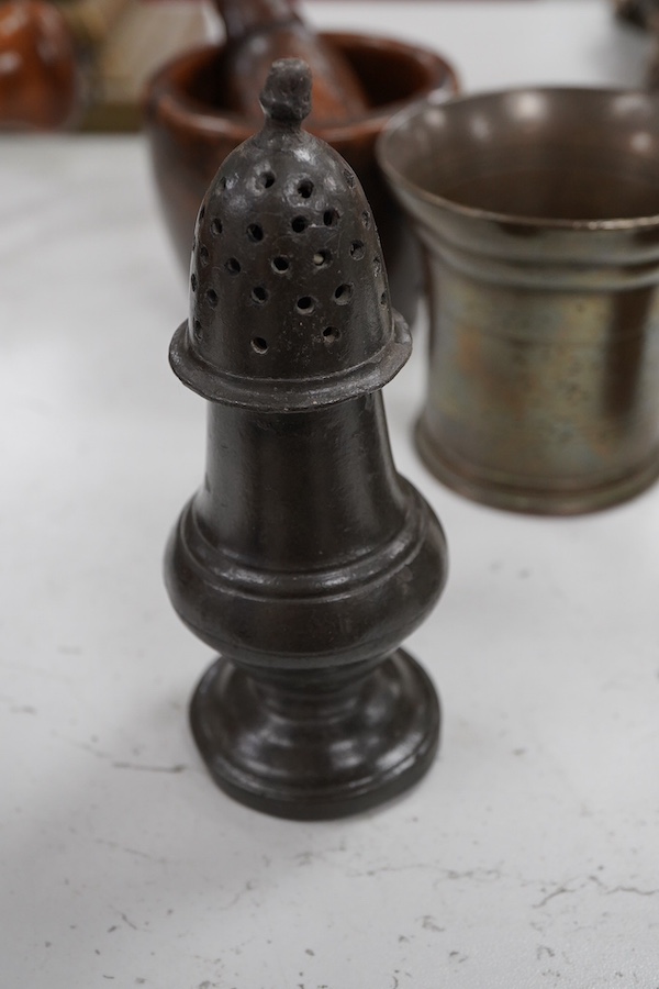 Sundry items to include a large pestle, spice grinder, flat iron on stand, bronze mortar and three other items, largest 42cm in length